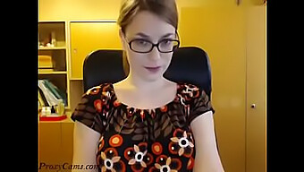 Nerdy Camgirl Teases With Glasses And Striptease On Webcam