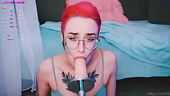 Tattooed Girl Gives A Blowjob To A Dildo